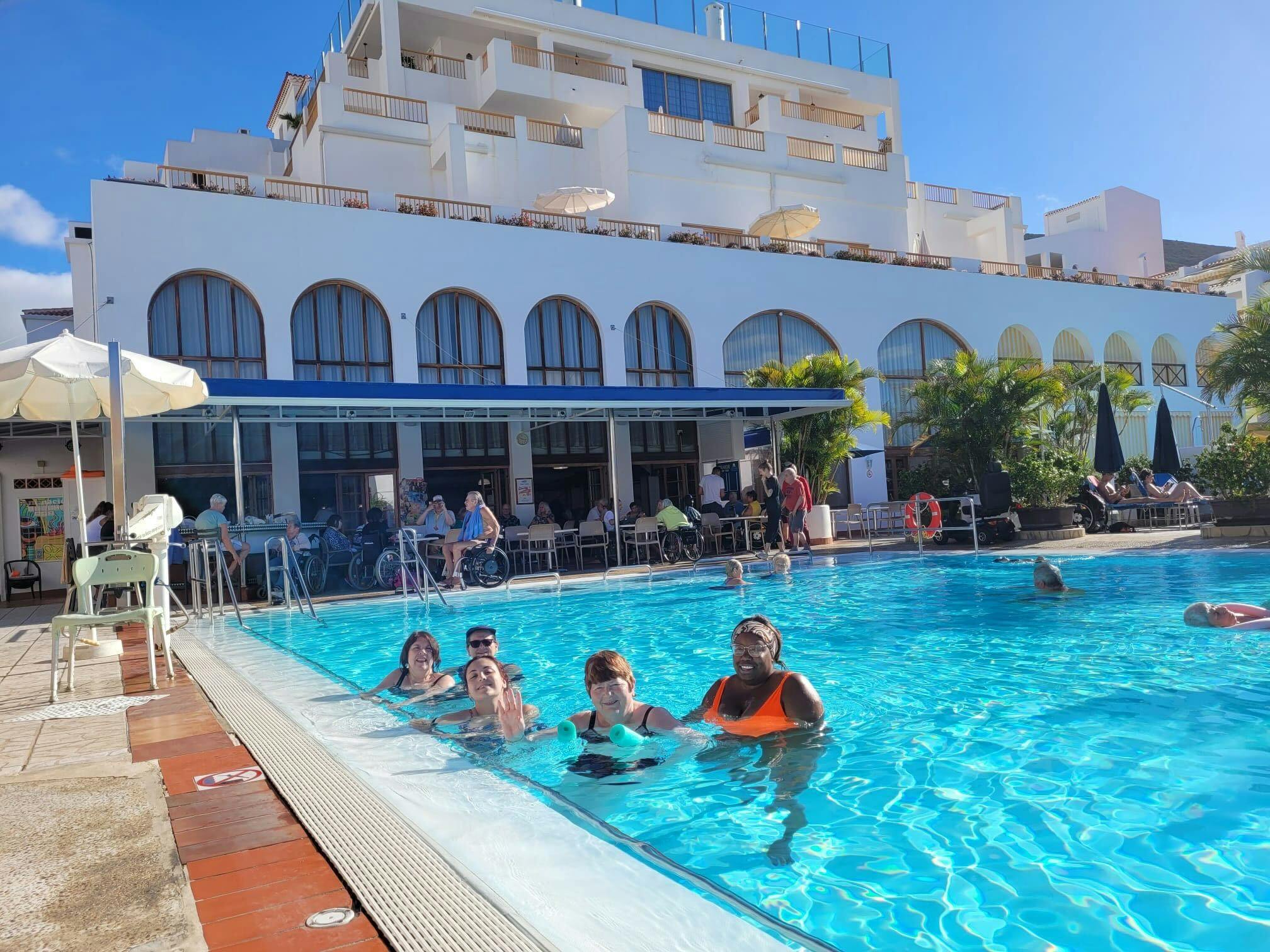 Customers enjoying the pool at resort in Tenerife
