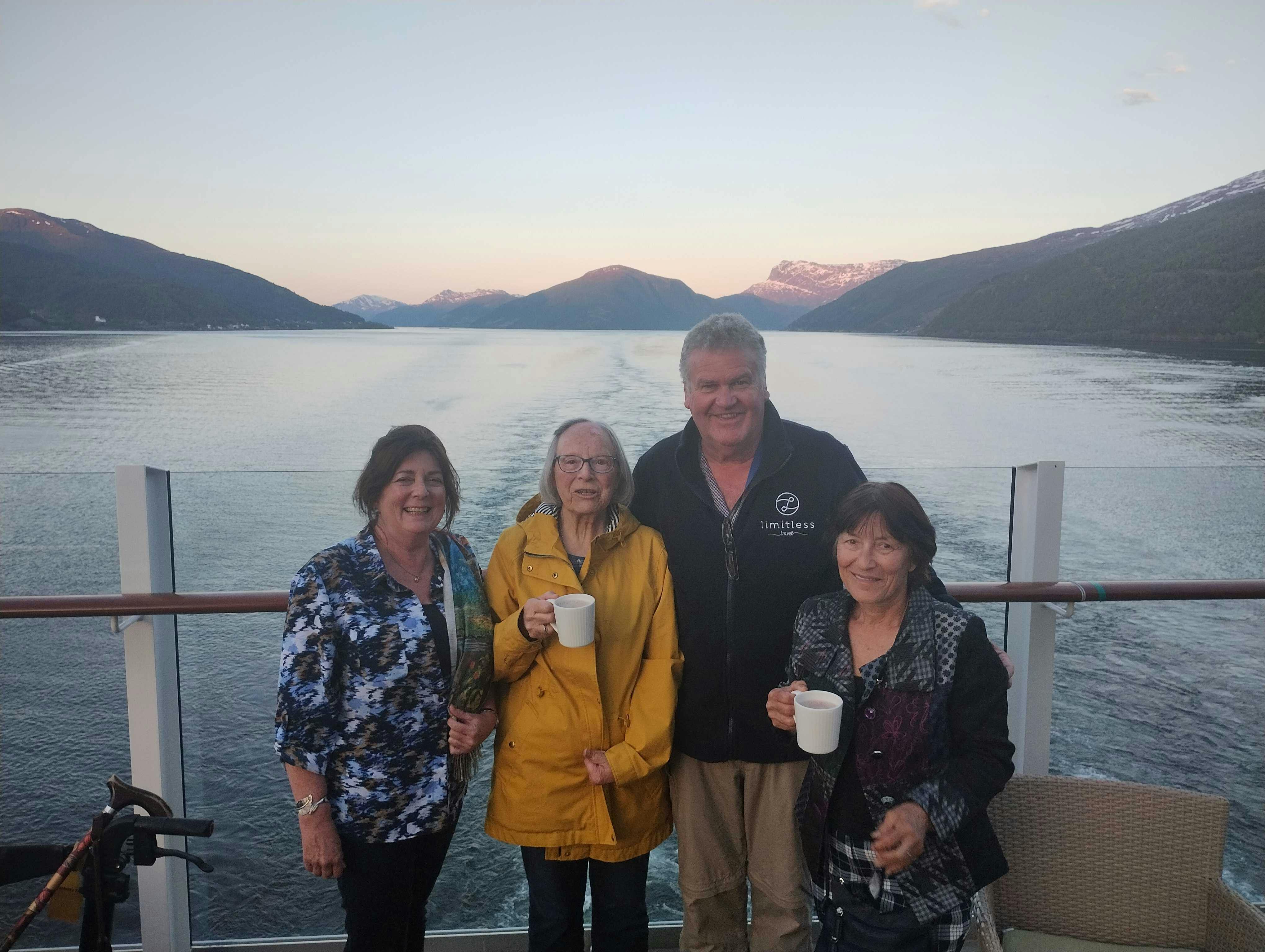 Cruise customers and staff enjoying the views of Norway