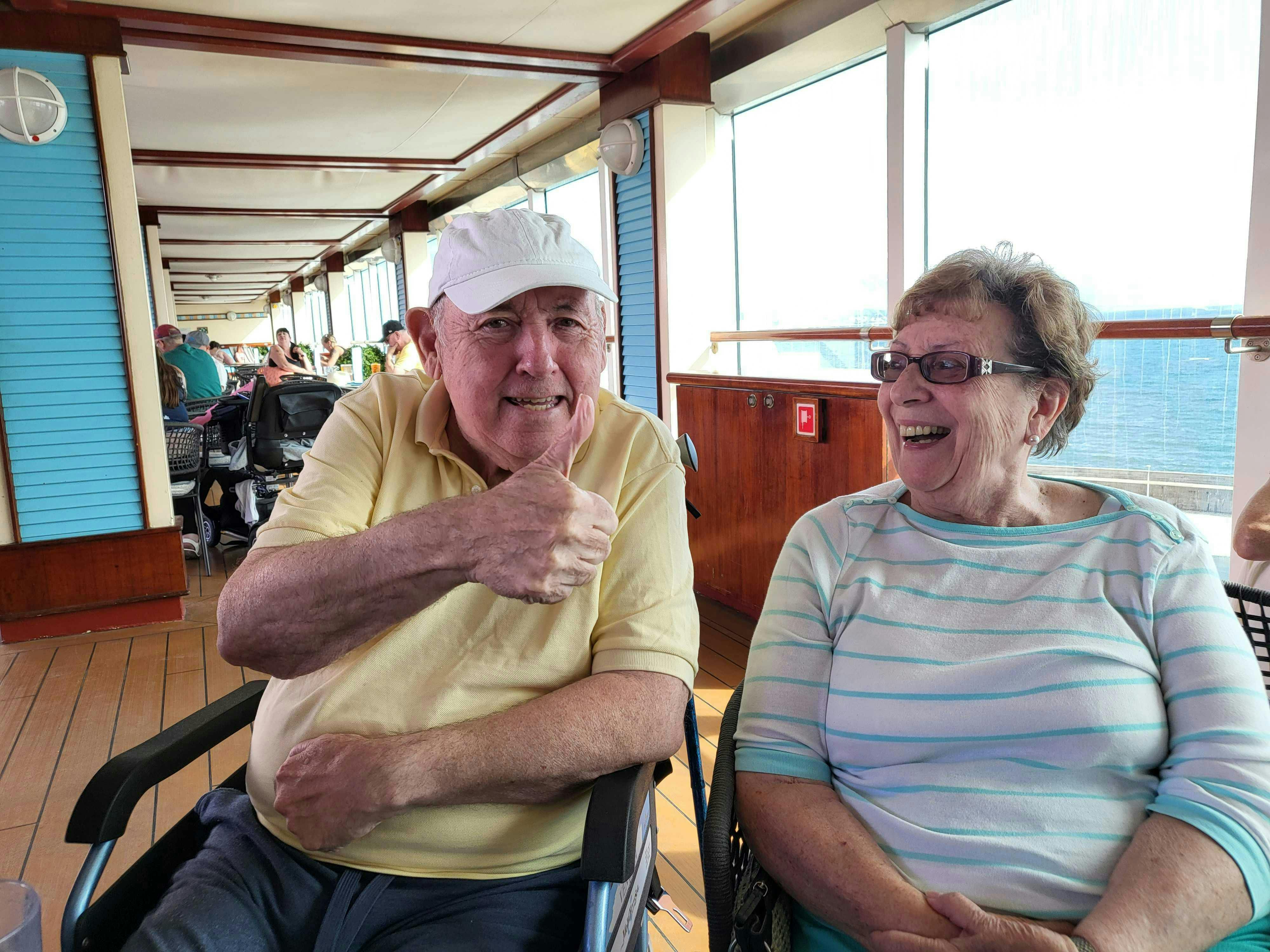 Customers and Limitless staff sat by the Pool on a P&O cruise ship
