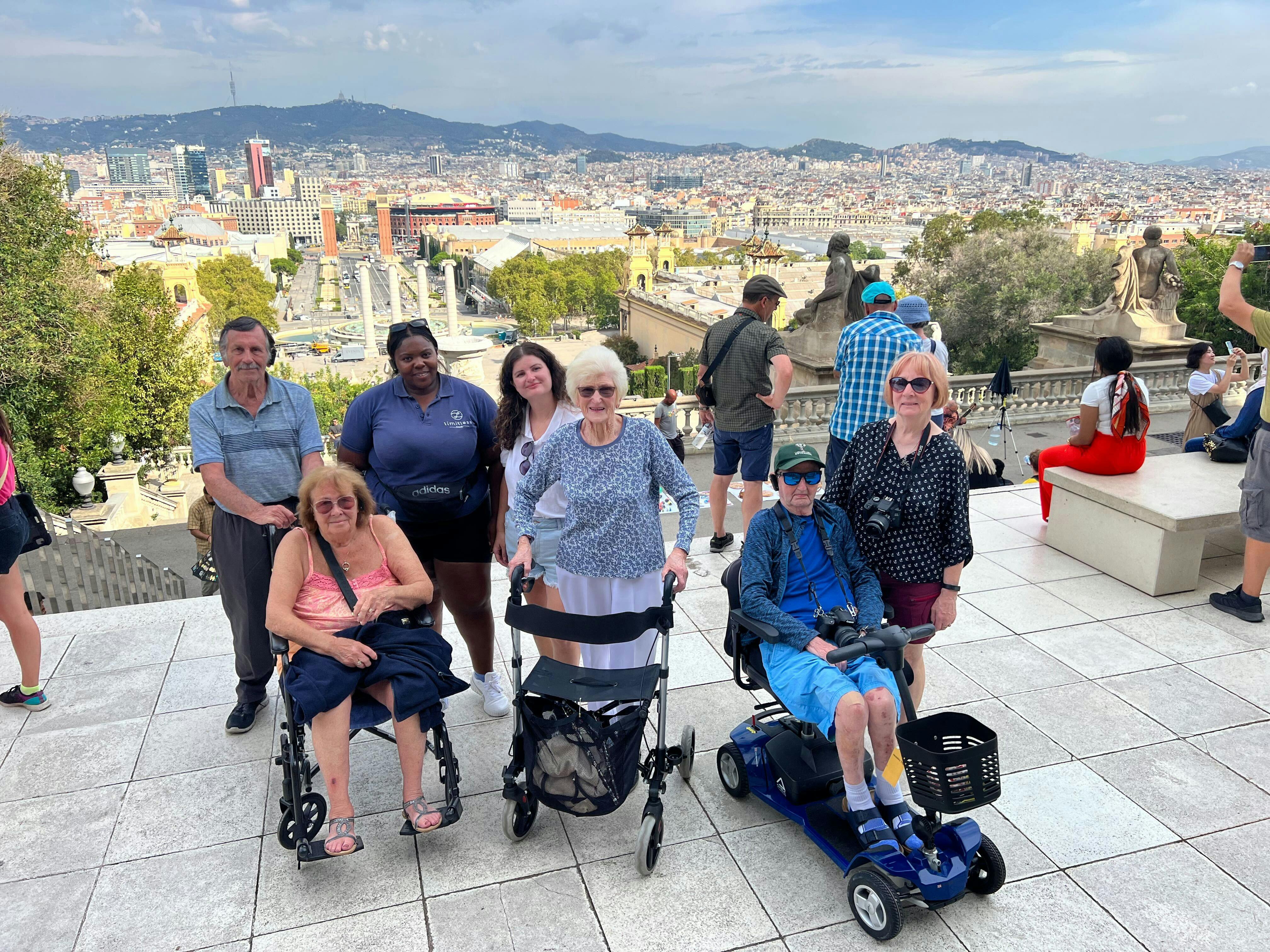 Customers and Limitless staff in Lisbon, Portugal, looking out over the city