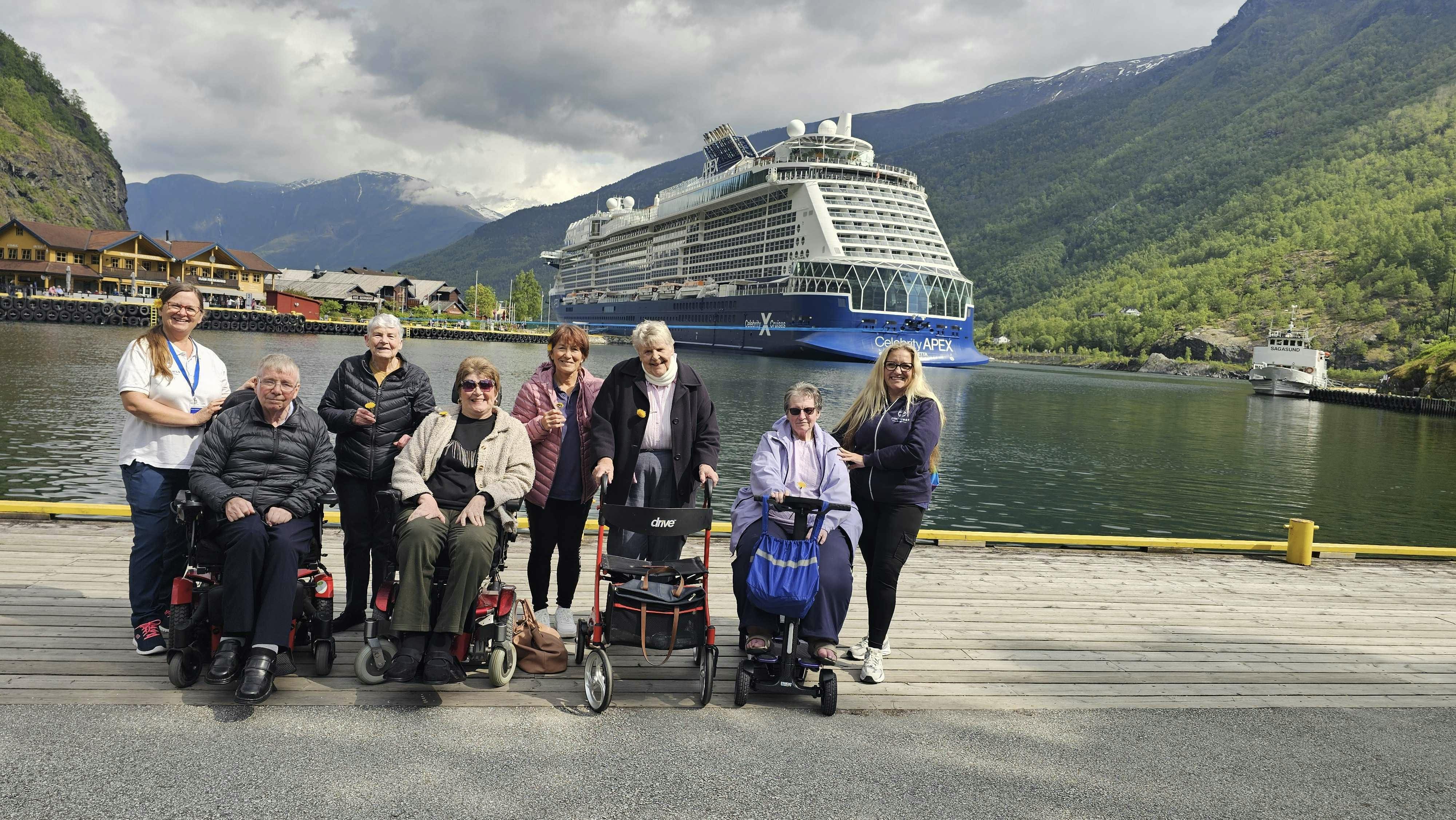 Cruise customers in front of the Celebrity Apex ship in Norway