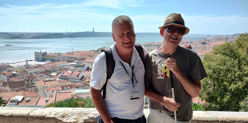 Customer and Limitless staff exploring the port of Lisbon, Portugal, on a cruise excursion