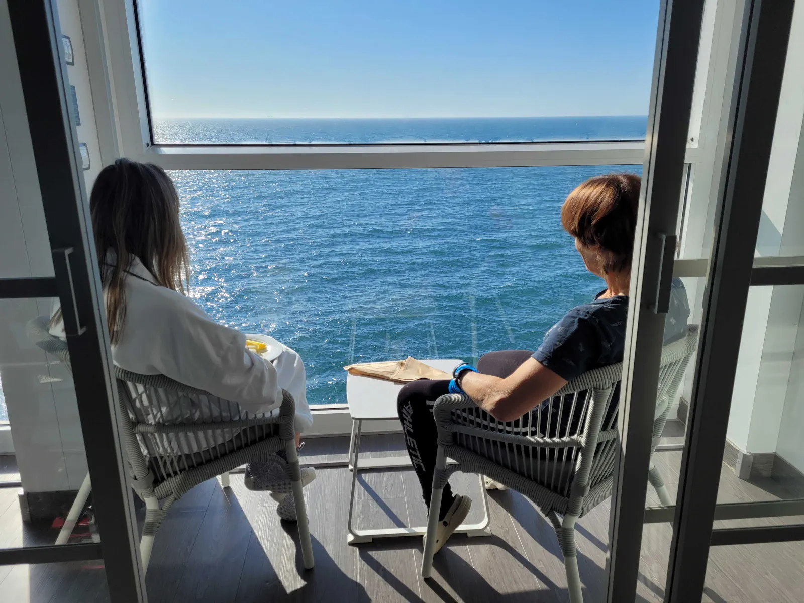 Cruise customers enjoying views from Celebrity Cruises Apex ship