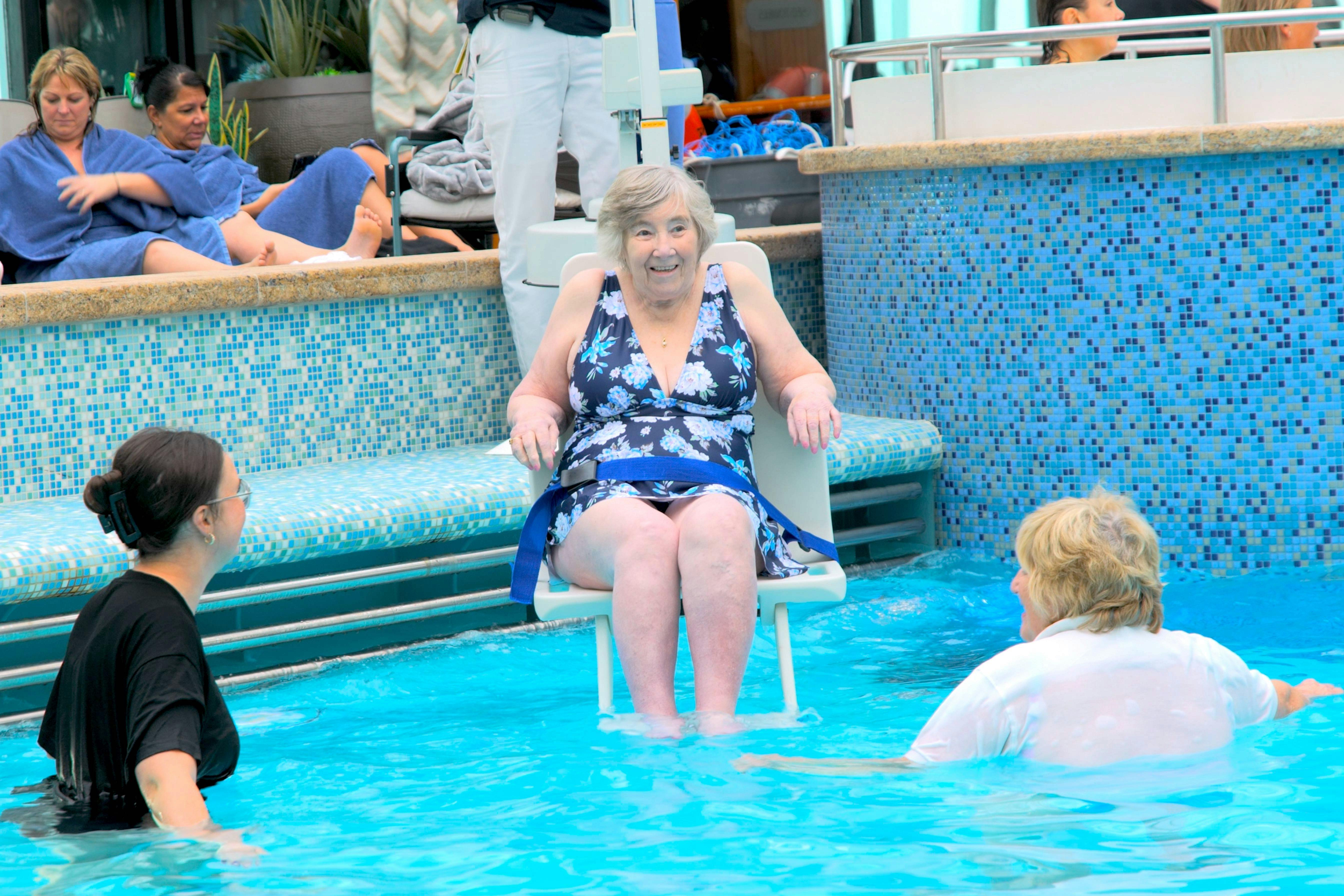Cruise customer being hoisted into the pool on a P&O cruise ship