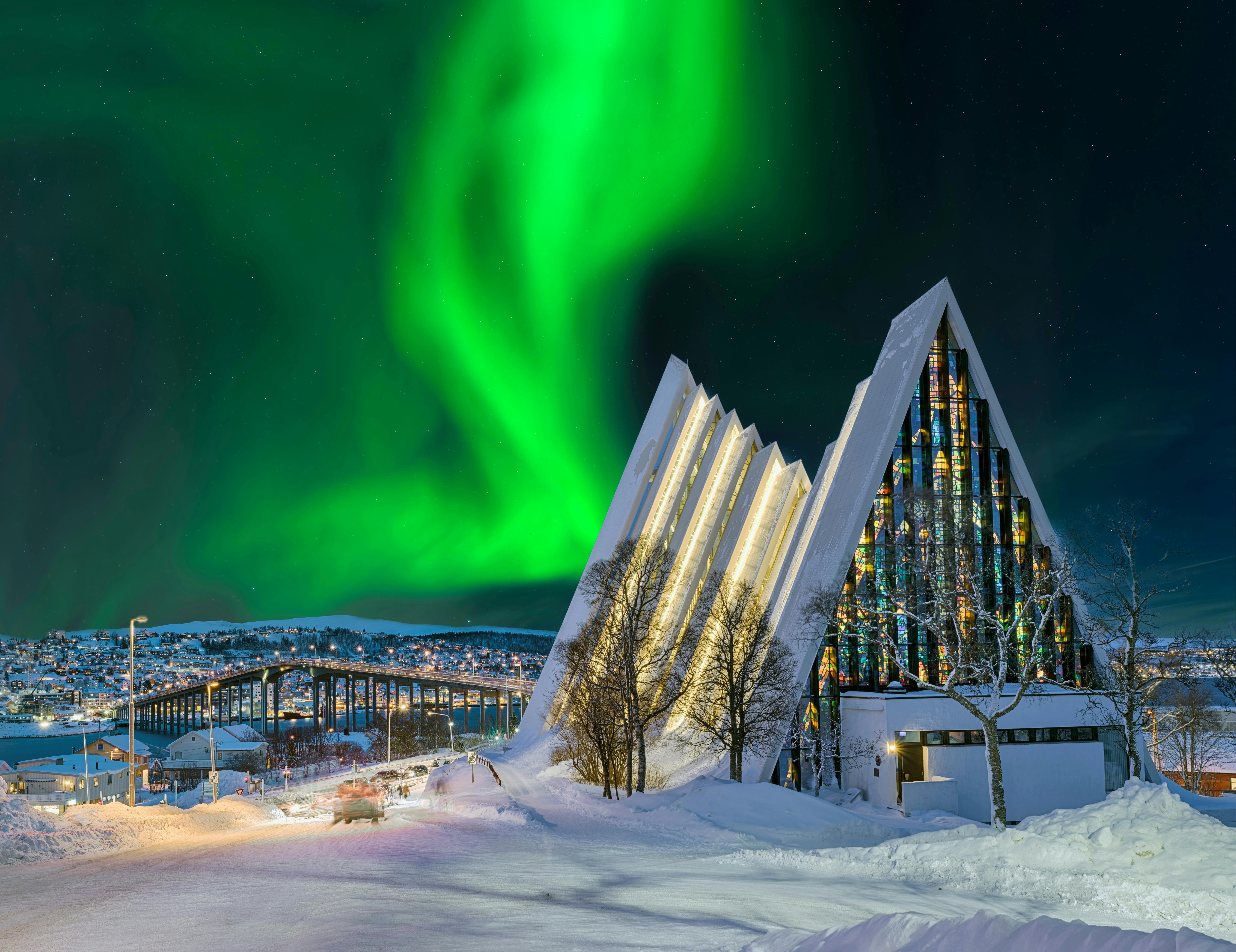 Tromso, Norway, with the northern lights over the cathedral