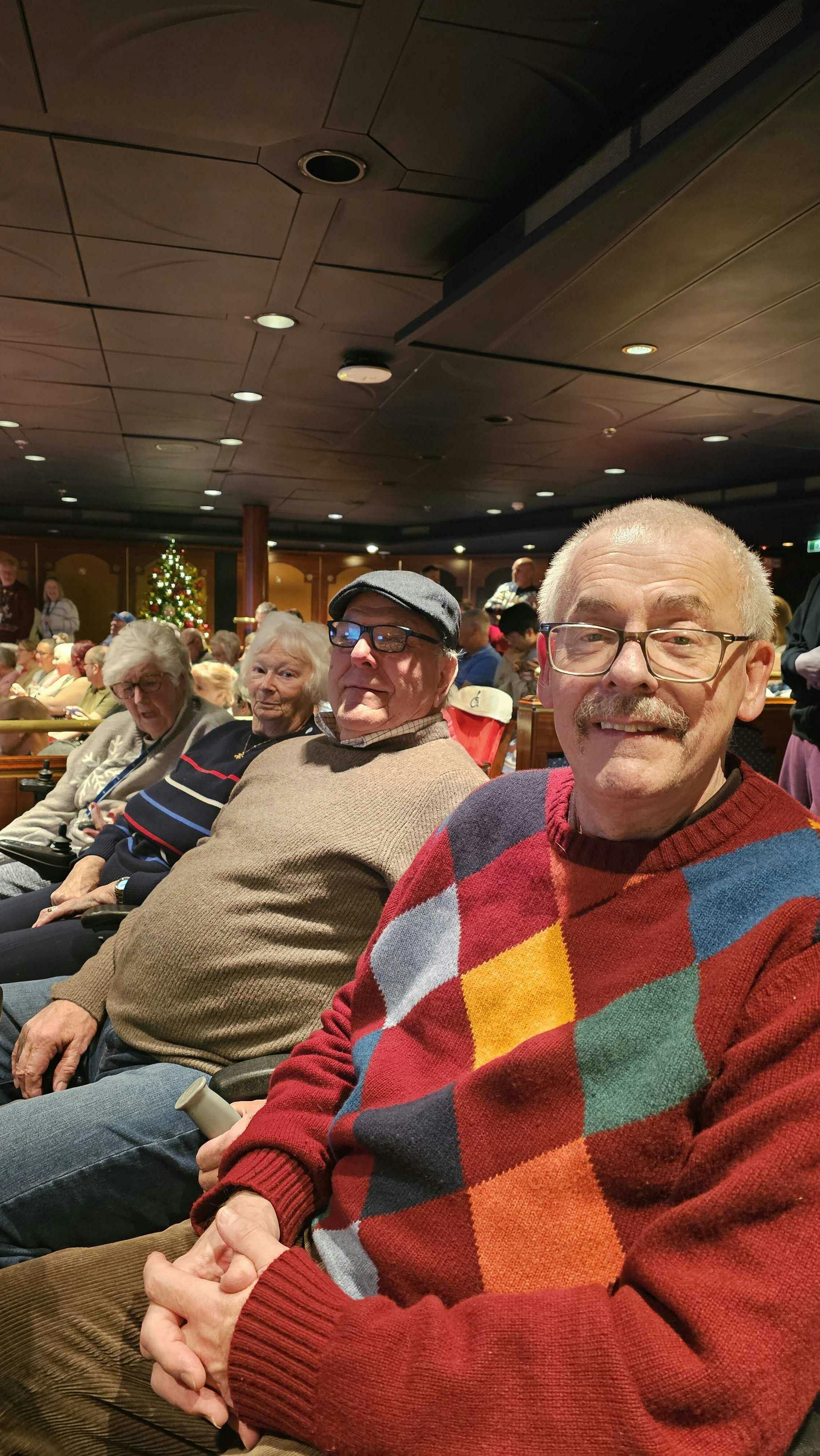 Guests at theatre on cruise