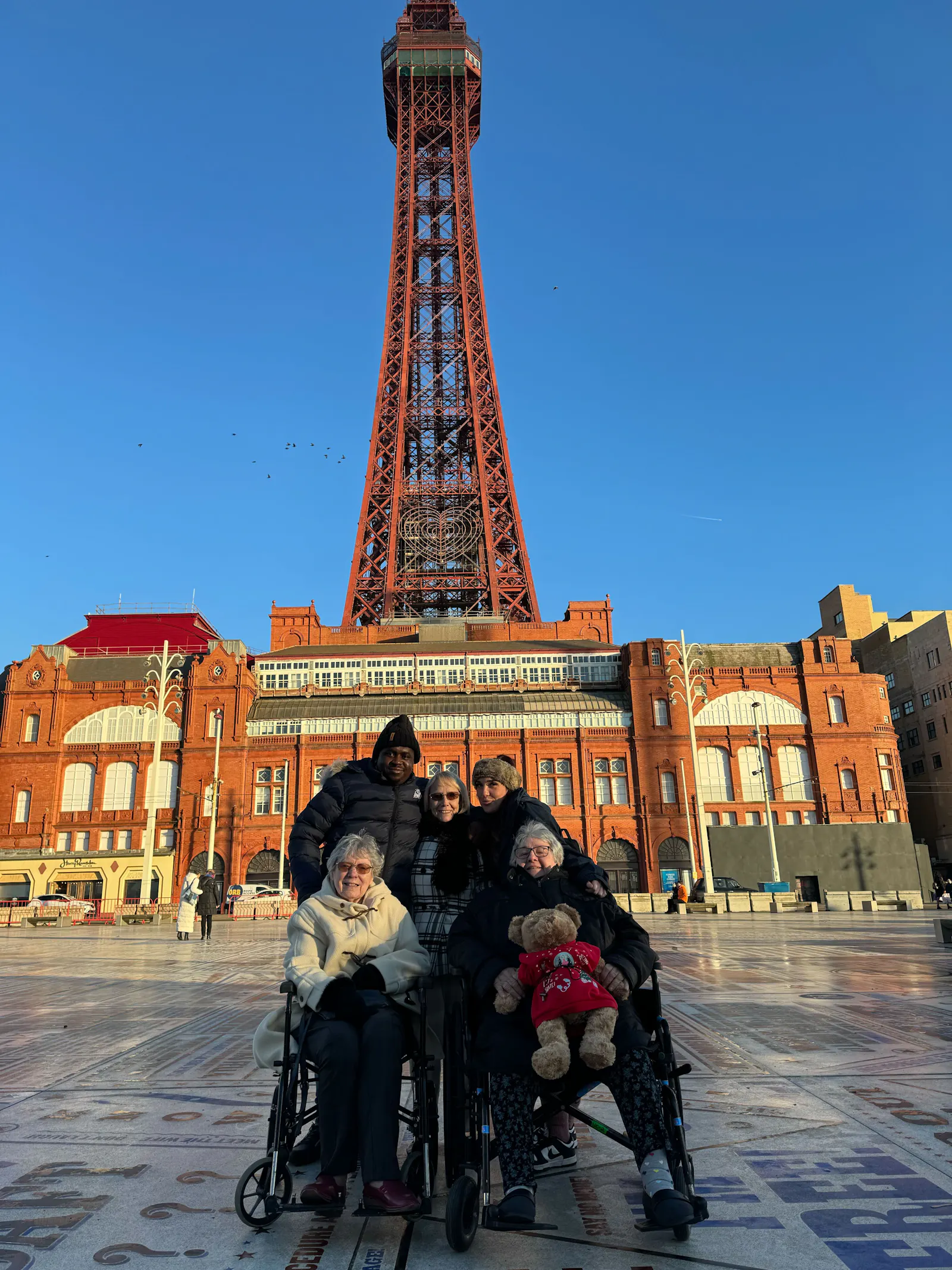 Guests and Limitless team in front of the Blackpool Tower.
