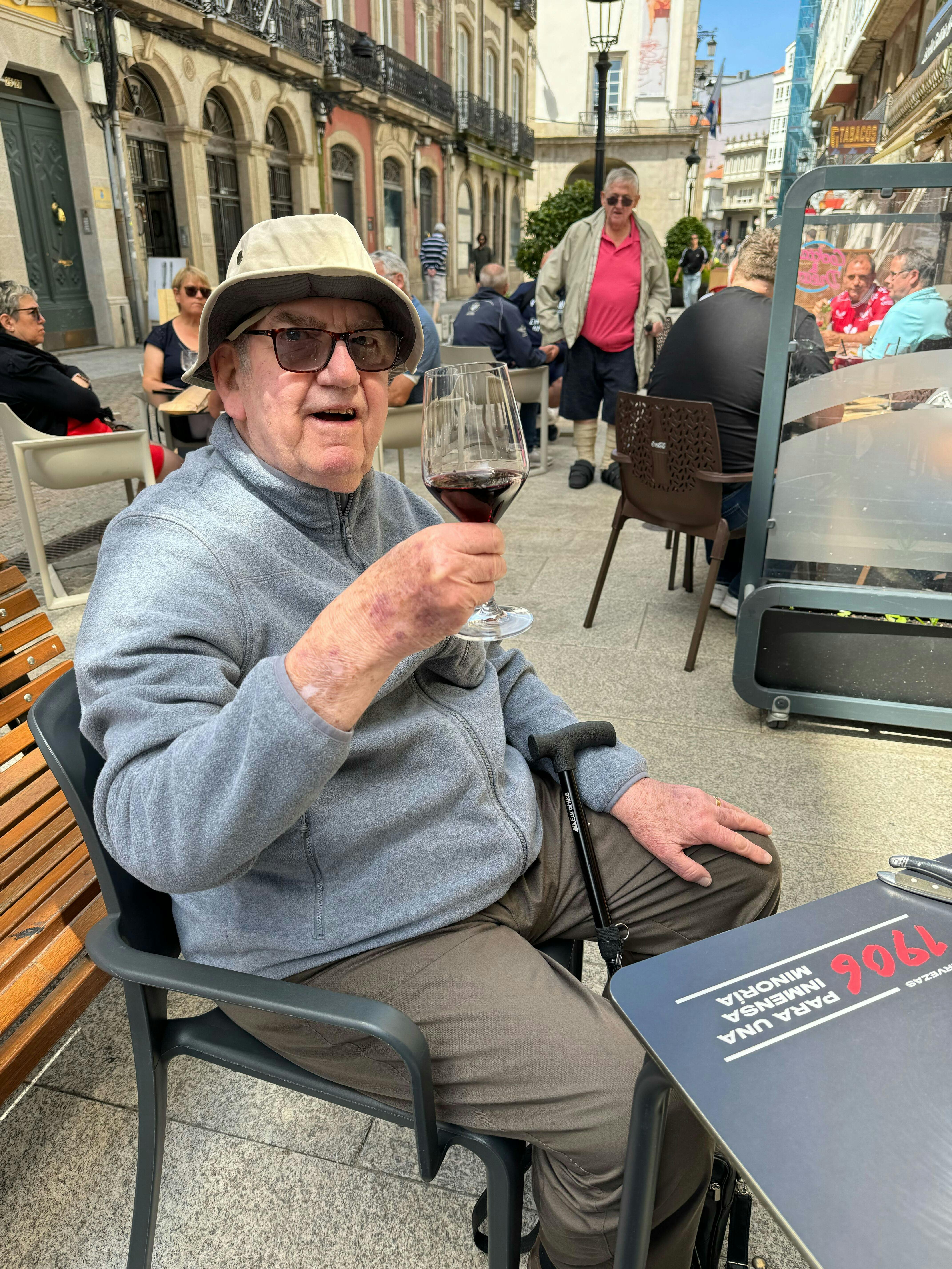 Customer raising a glass in A Coruna Spain