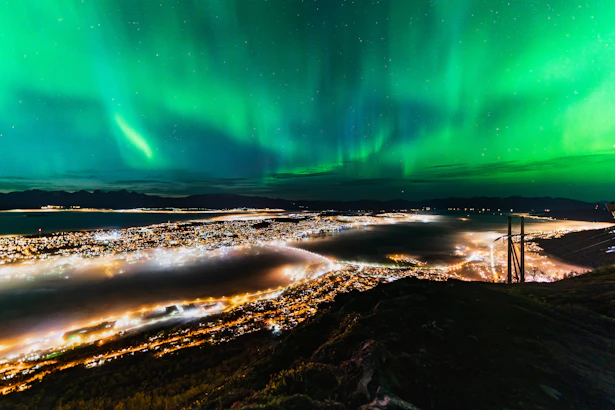 Tromso Norway at night with this northern Lights