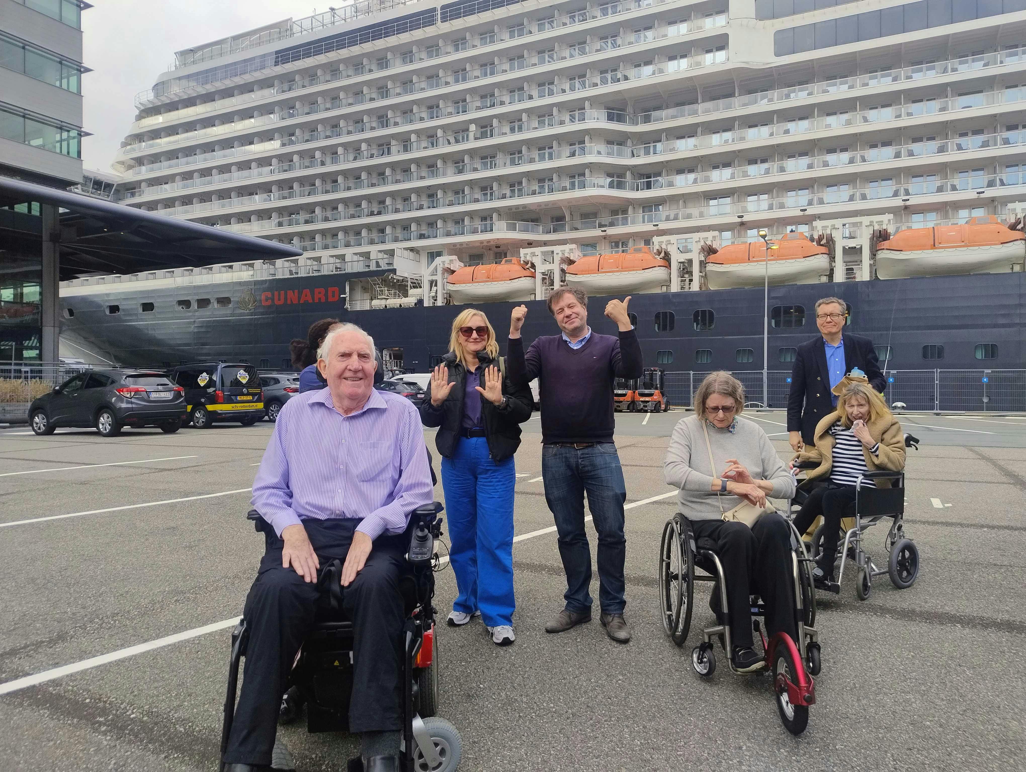 Customers and staff outside Cunard Queen Anne