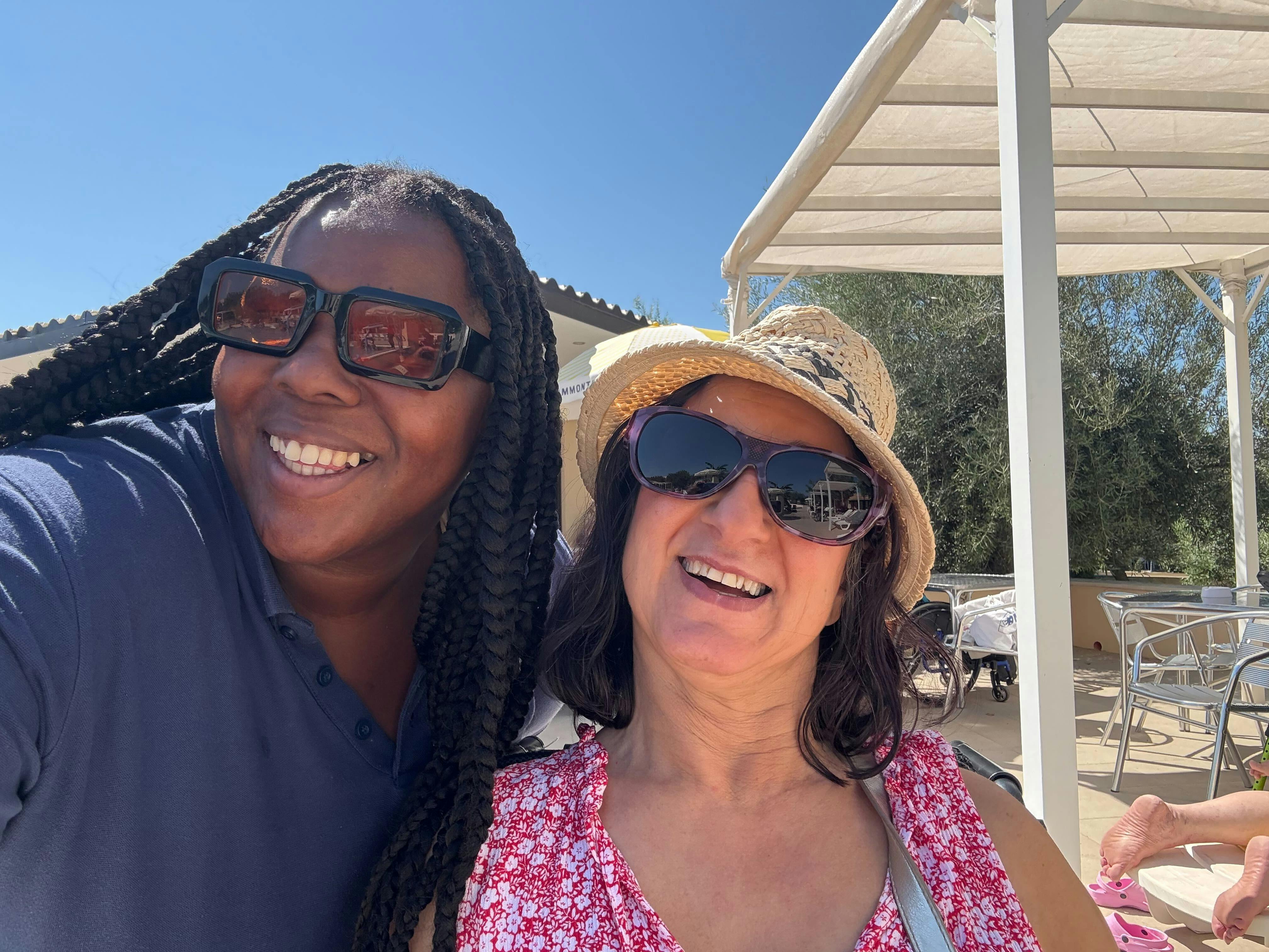 Limitless staff taking a selfie with a customer in Sicily