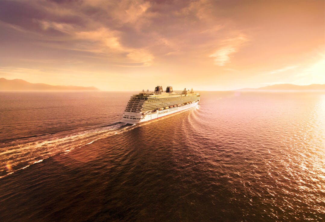 Britannia Cruise ship at sea, sunset