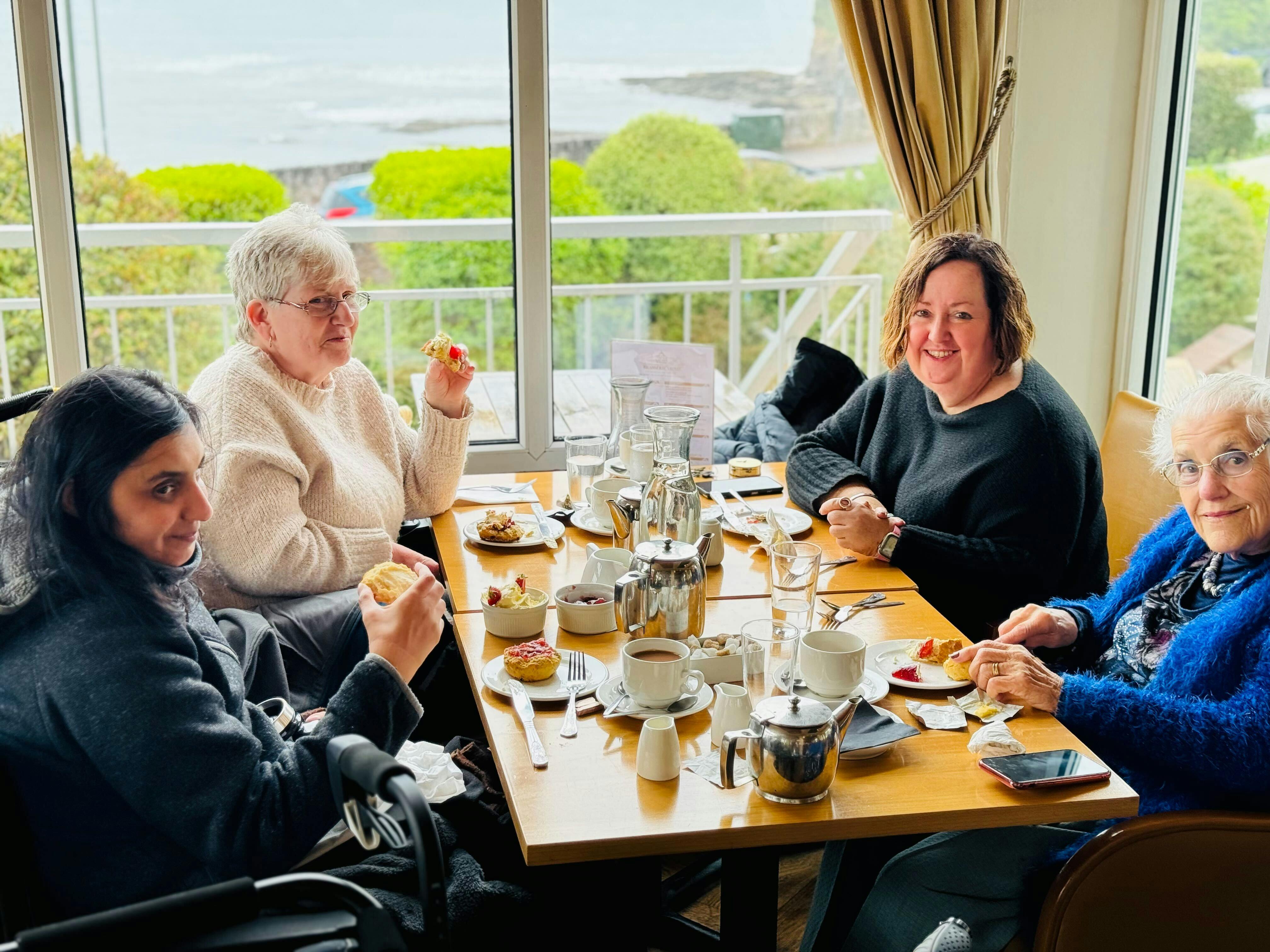 Customers enjoying cream tea in Devon