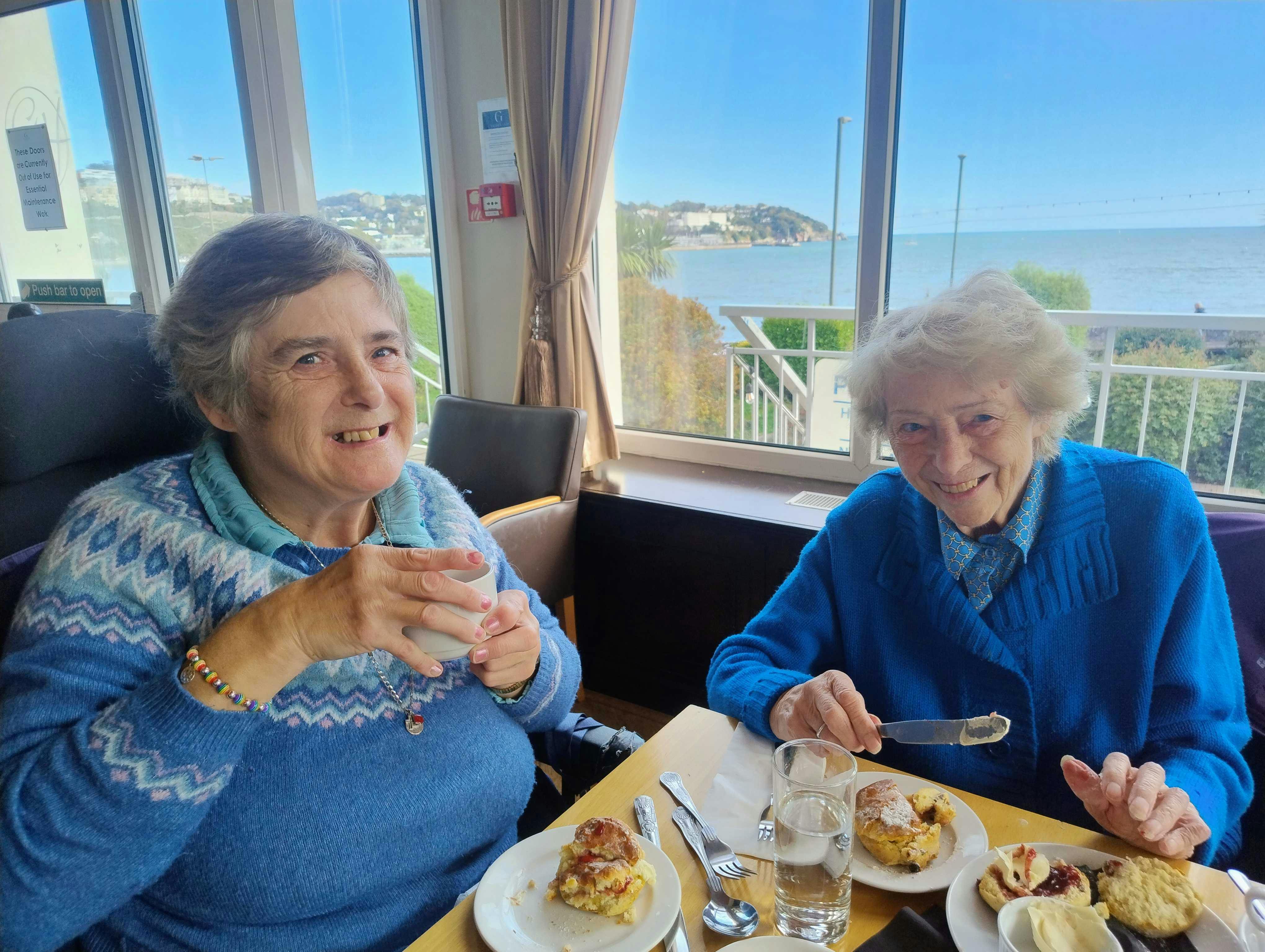 Customers enjoying cream tea in Cornwall