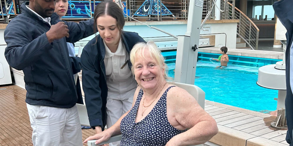 Cruise customer being hoisted into the pool on P&O cruise ship