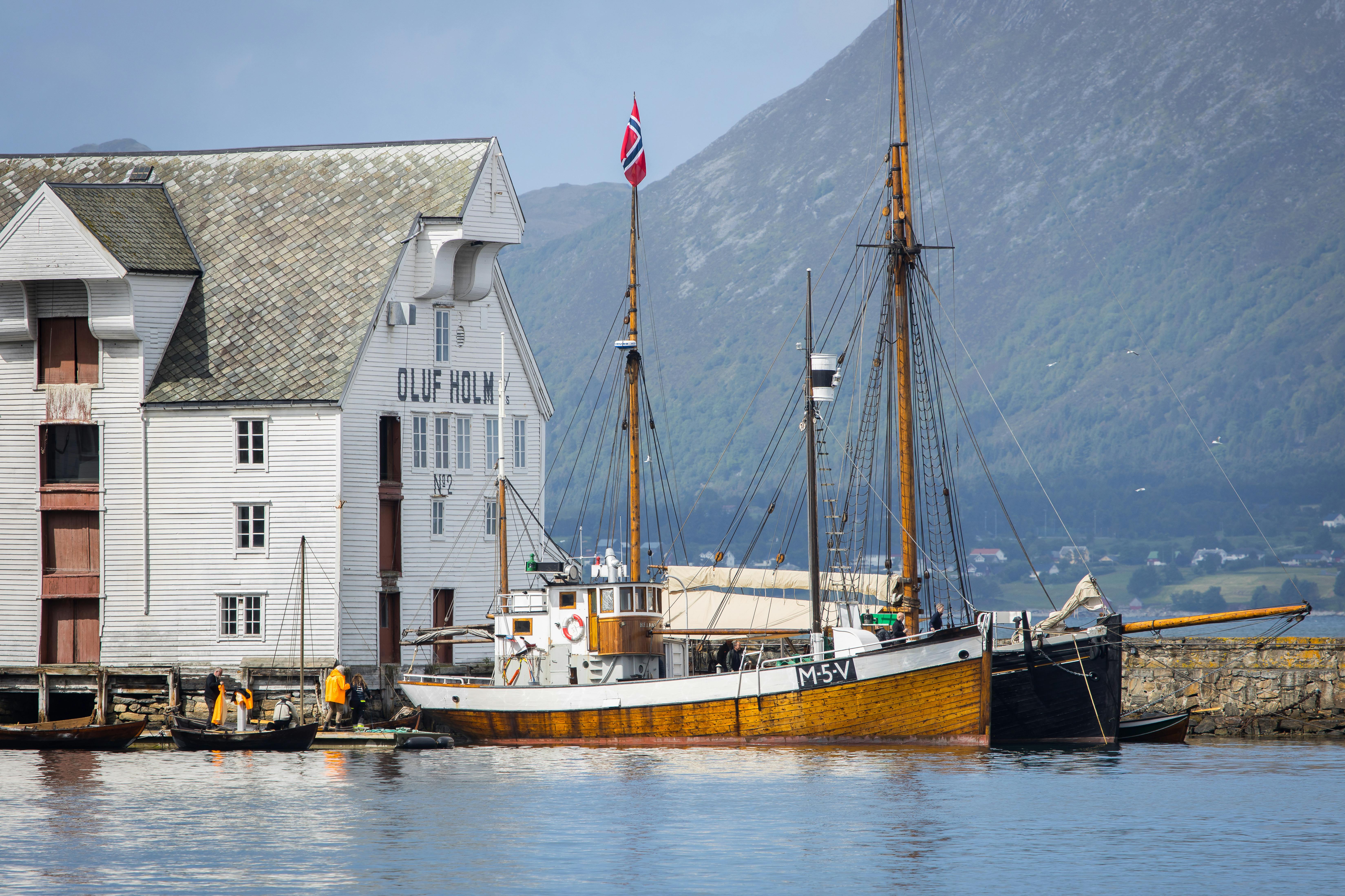 alesund small sailing ship in port