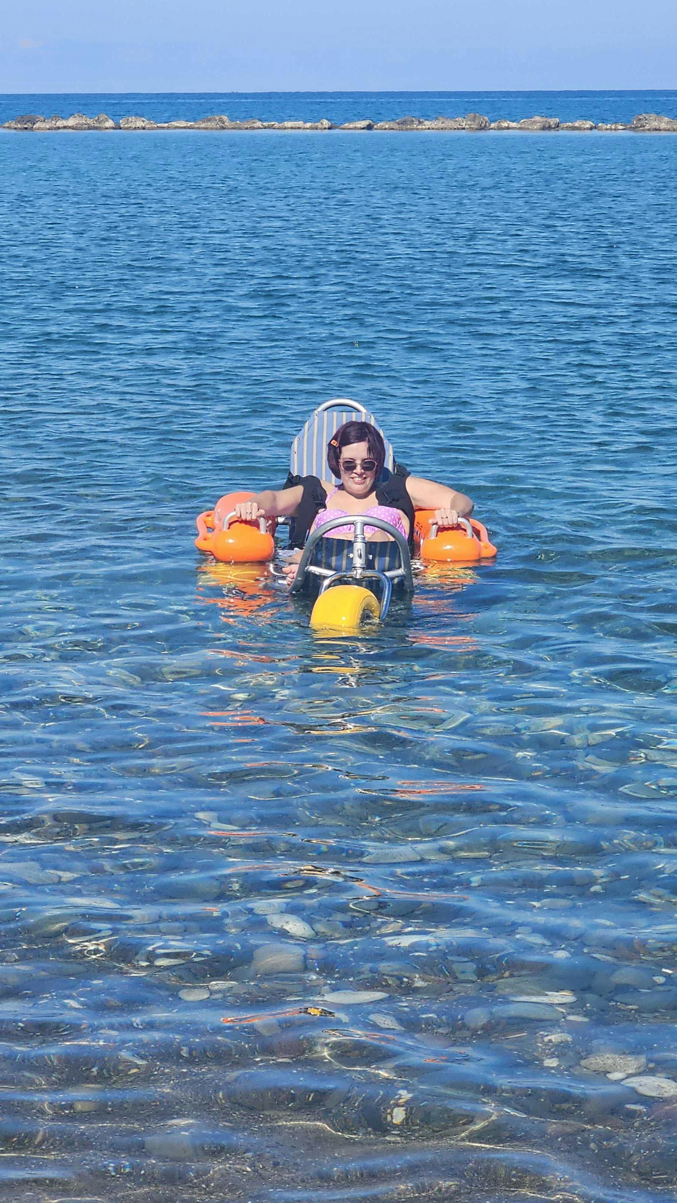 Customer using beach wheelchair in Cyprus